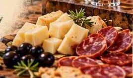 Platter of local cheeses, olives and cured meats